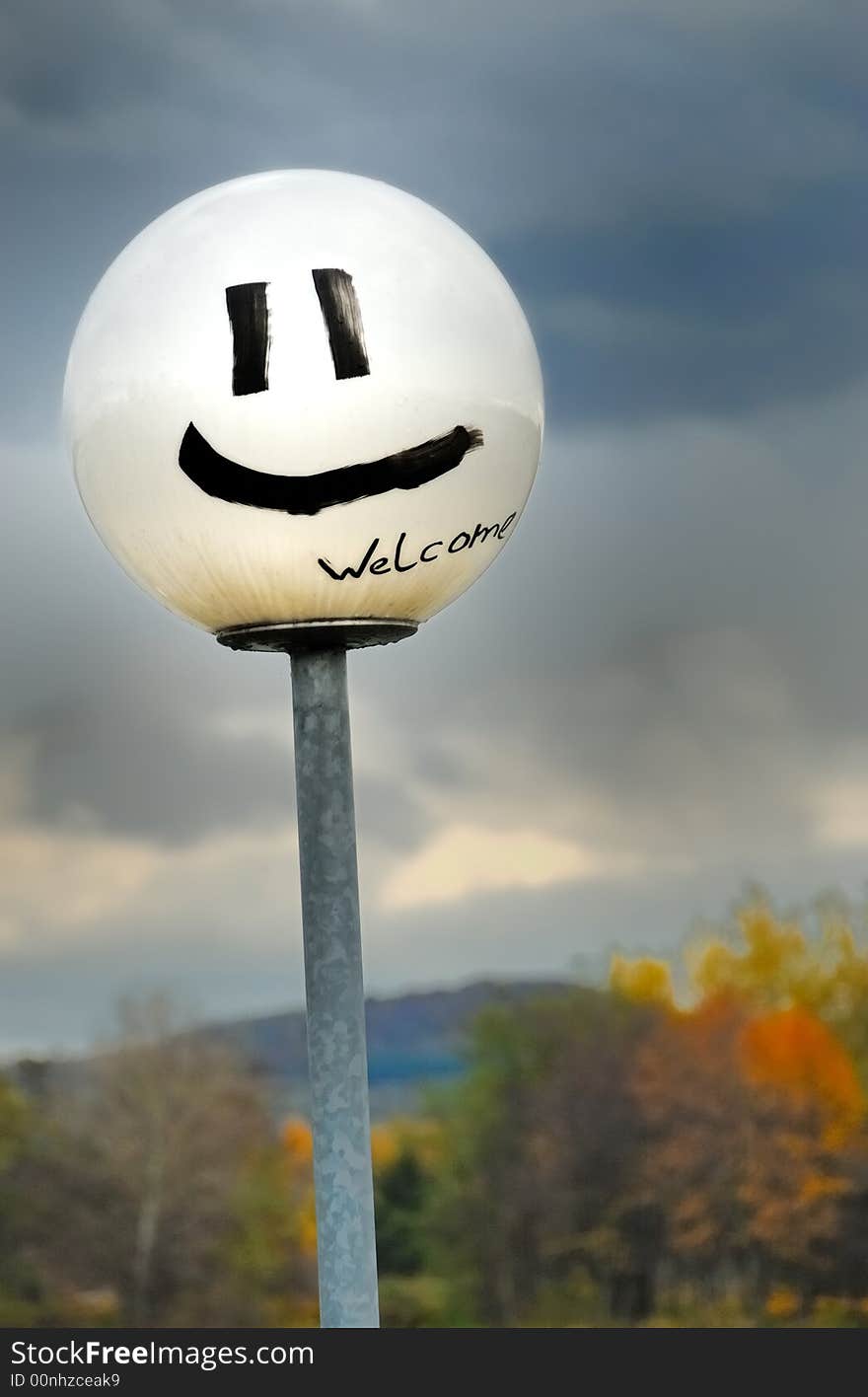 Lantern with a laughing smily in Stein. Lantern with a laughing smily in Stein