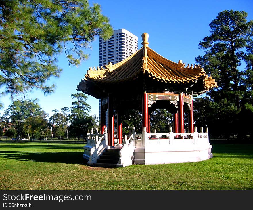 Japanese garden with Pagoda and high-rise building behind