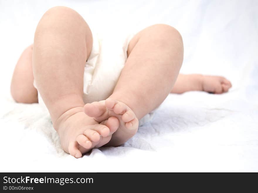 Newborn's feet on white background. Newborn's feet on white background