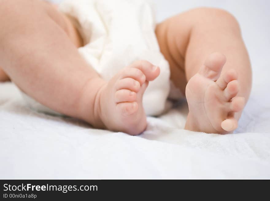 Newborn's feet on white background. Newborn's feet on white background