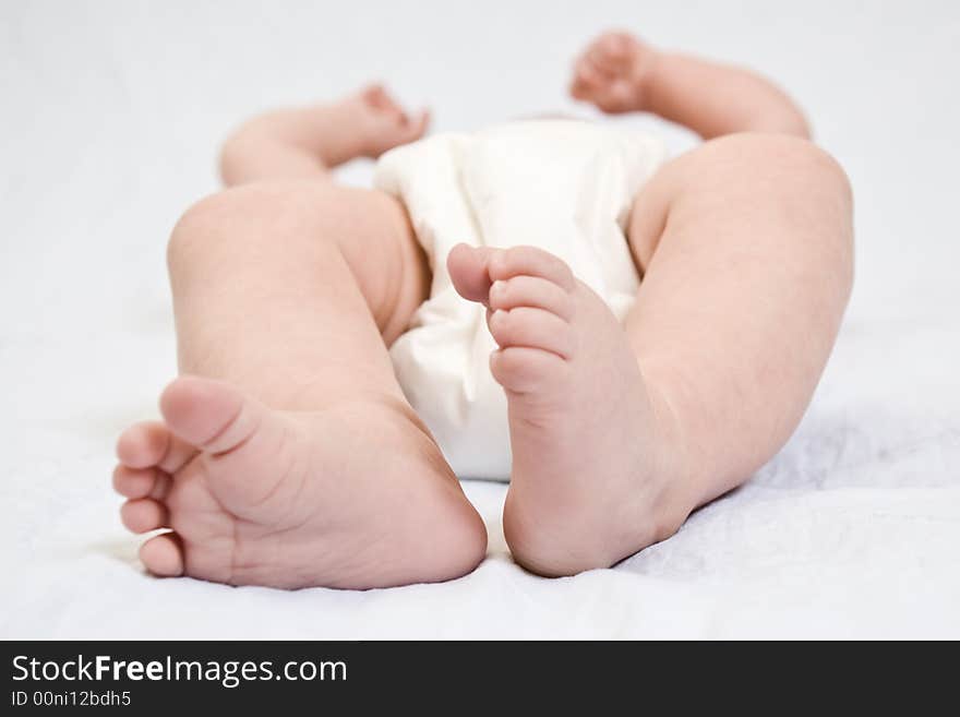 Newborn's feet on white background. Newborn's feet on white background