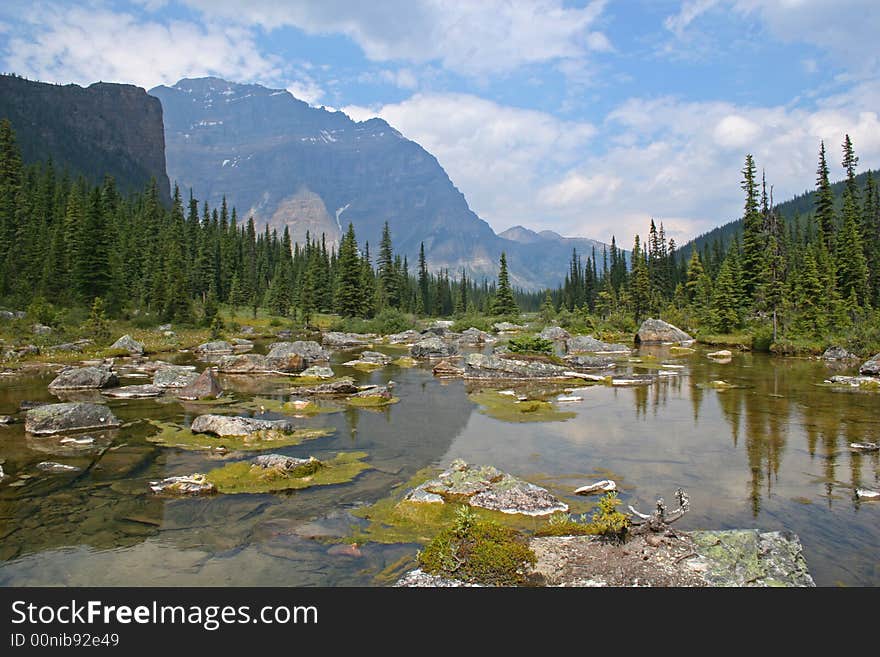 A small lake at the end of a hike near Moraine Lake in Banff NP, Canada. . A small lake at the end of a hike near Moraine Lake in Banff NP, Canada.