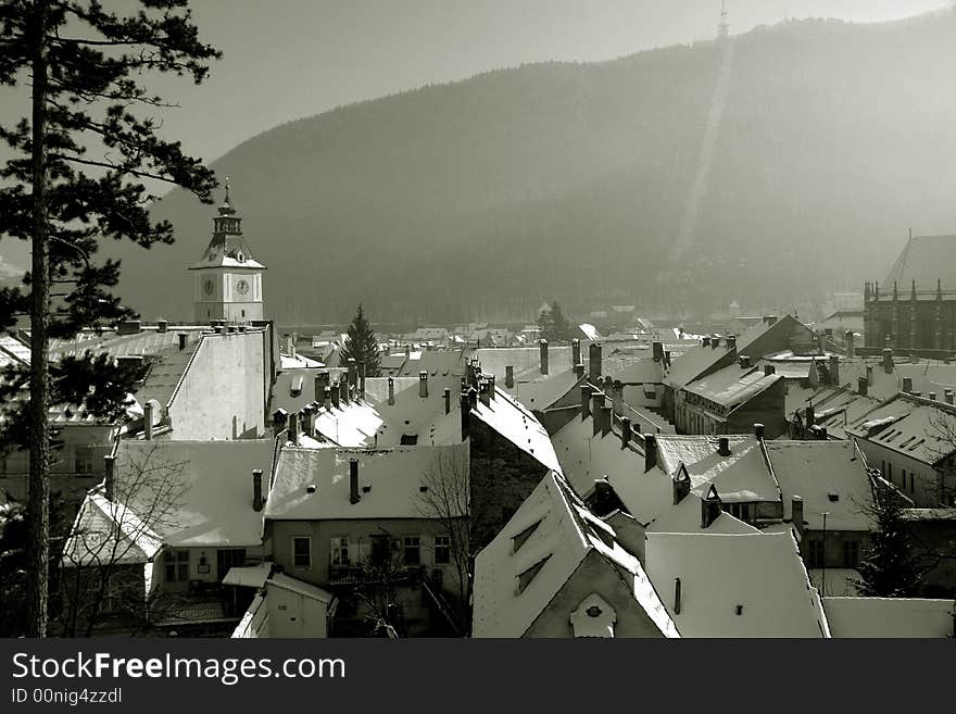 Scenic view on rooftops in Brasov Romania. Winter time. Scenic view on rooftops in Brasov Romania. Winter time