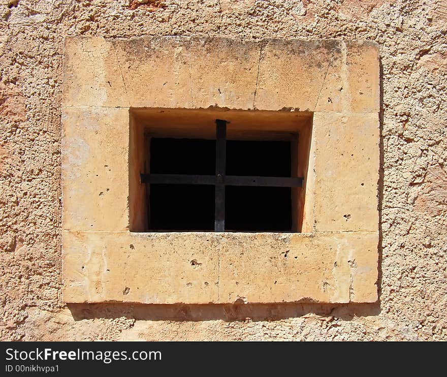 Narrow window on an ancient mediterranean building in Spain. Narrow window on an ancient mediterranean building in Spain