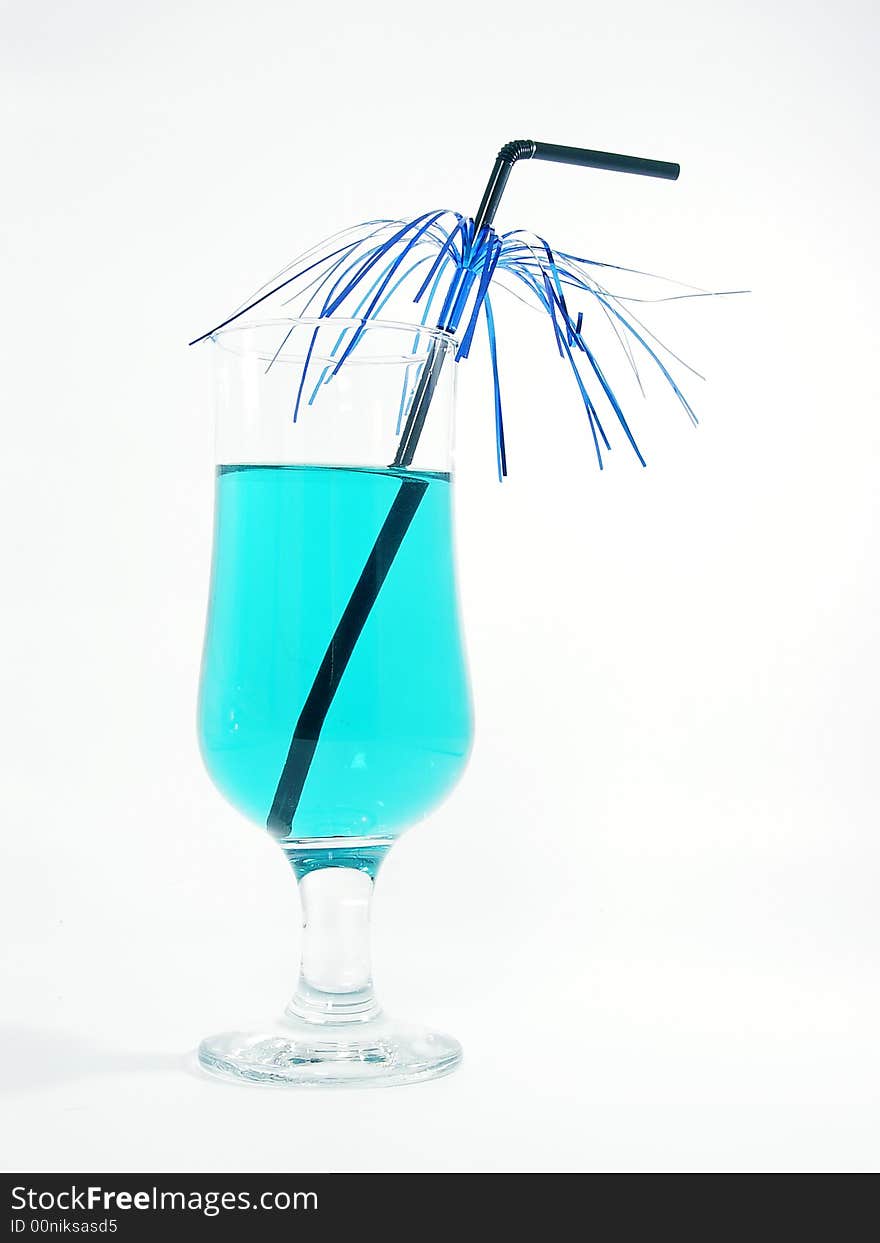 One glass with blue cocktail and straw on the white background