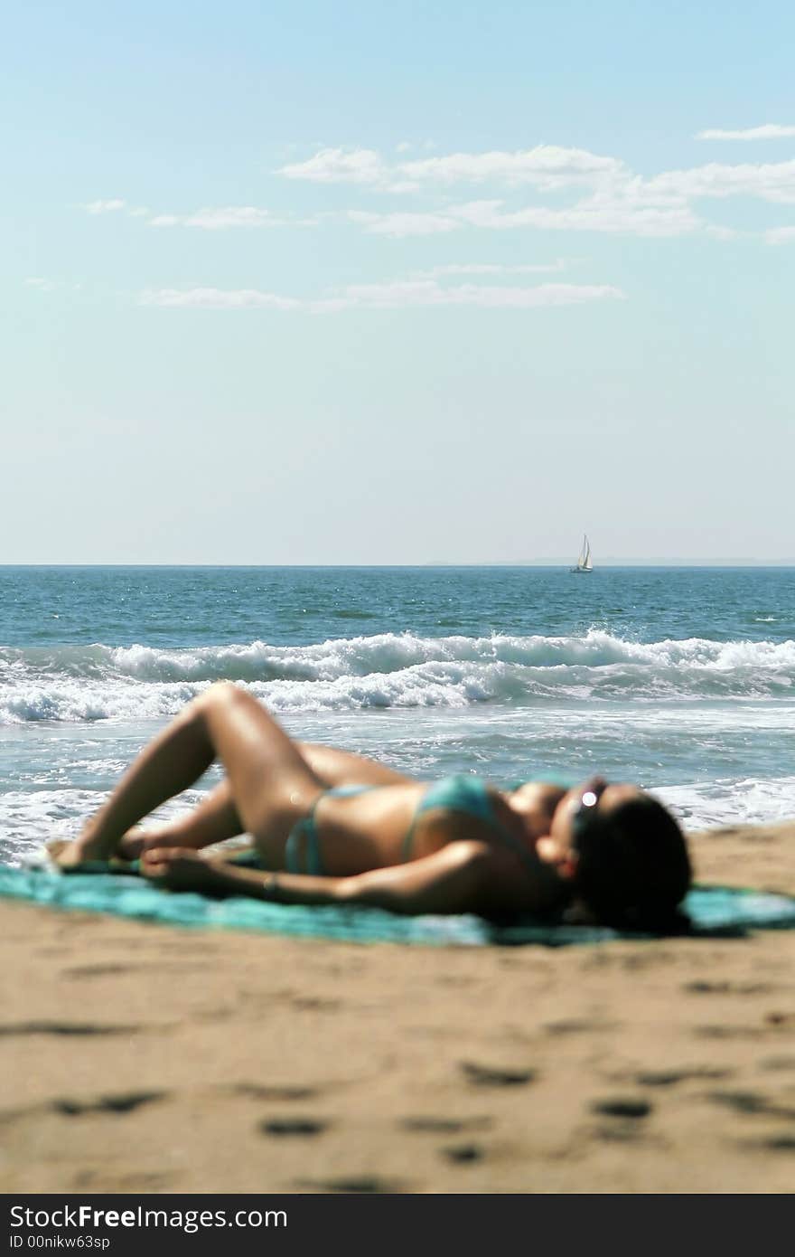 Sunbather On The Beach