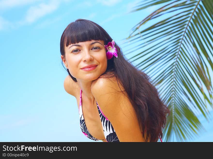 portrait of a young gorgeous female in tropical environment. portrait of a young gorgeous female in tropical environment