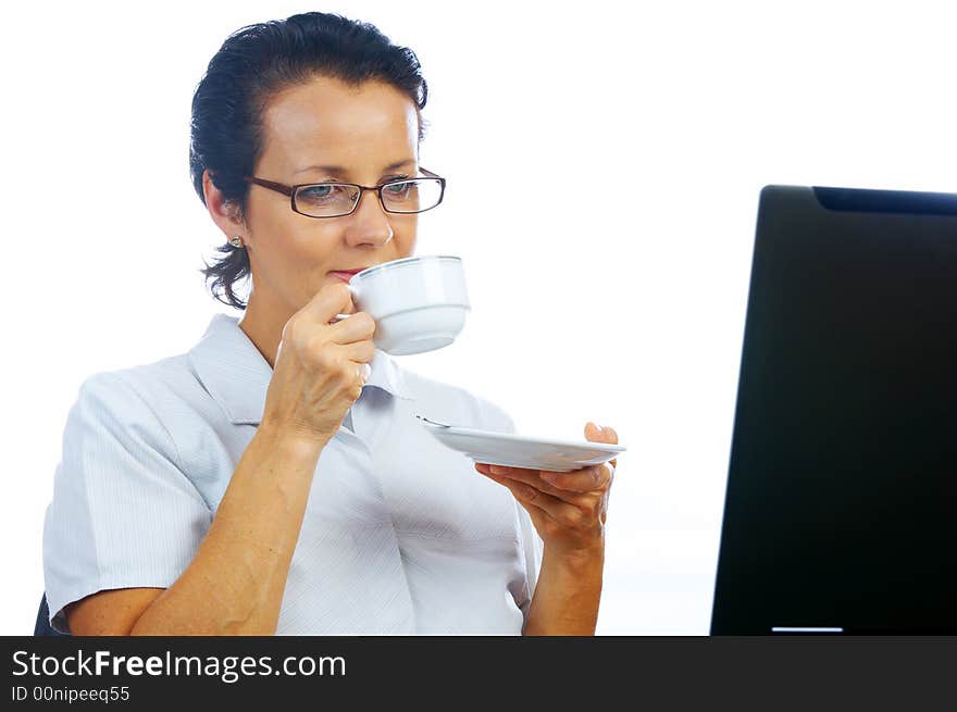 portrait of  businesswoman drinking coffee in office environment. portrait of  businesswoman drinking coffee in office environment