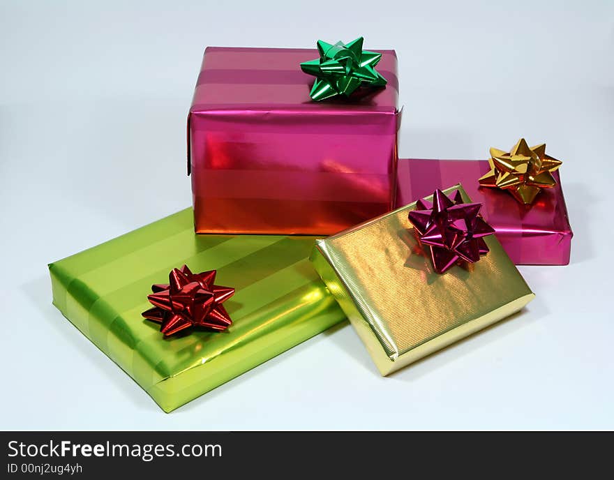 Gift boxes with ribbons on white background. Gift boxes with ribbons on white background