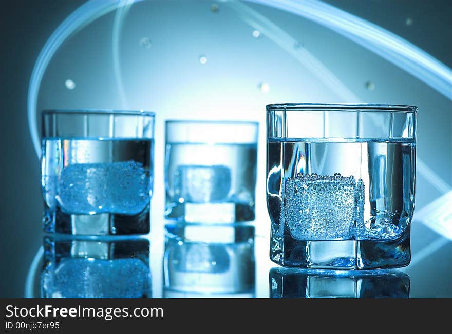 Three glasses of  pure mineral water. Three glasses of  pure mineral water