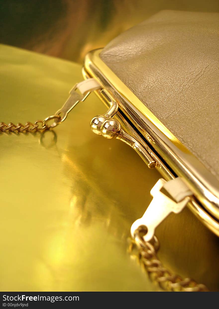 Golden womanish handbag