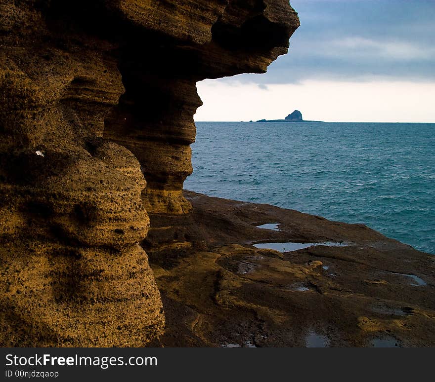 Sandstone mountain near sea