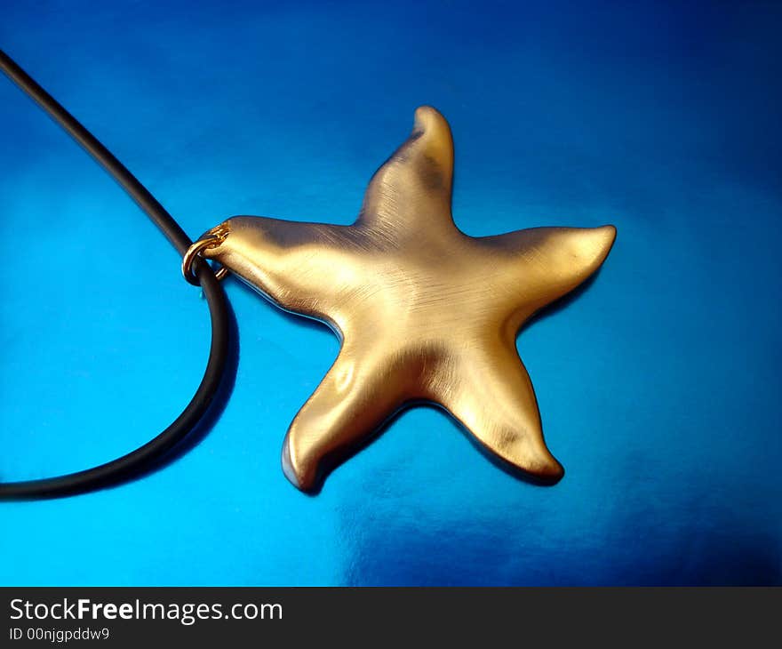 Golden star on blue background