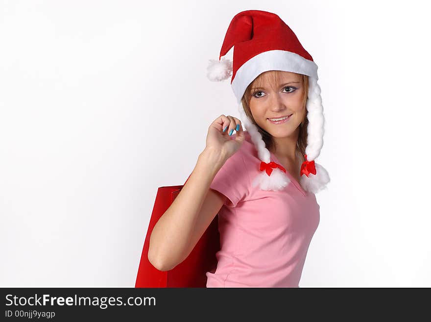 The girl in a red cap with a red package, Christmas