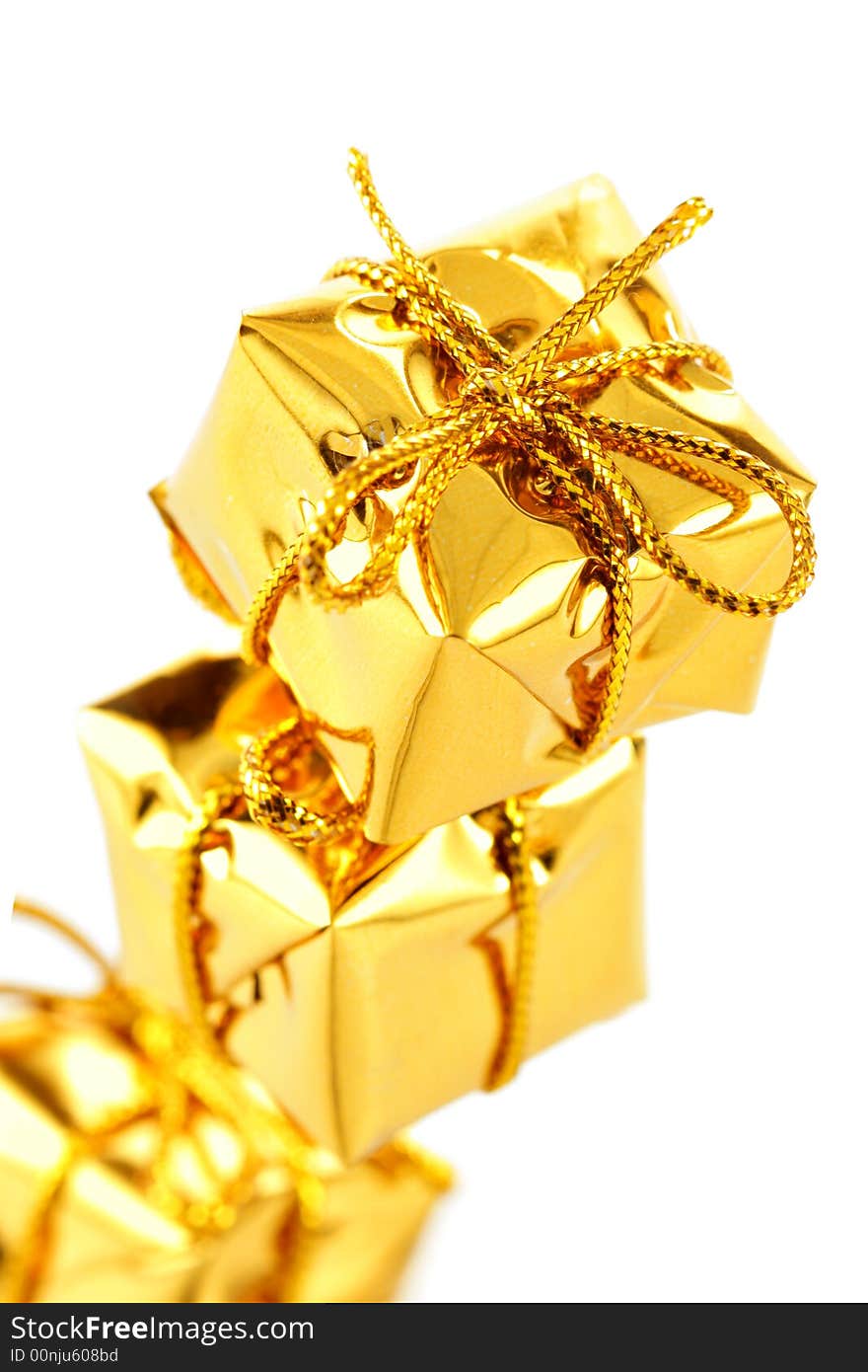 Three golden boxes isolated over white background