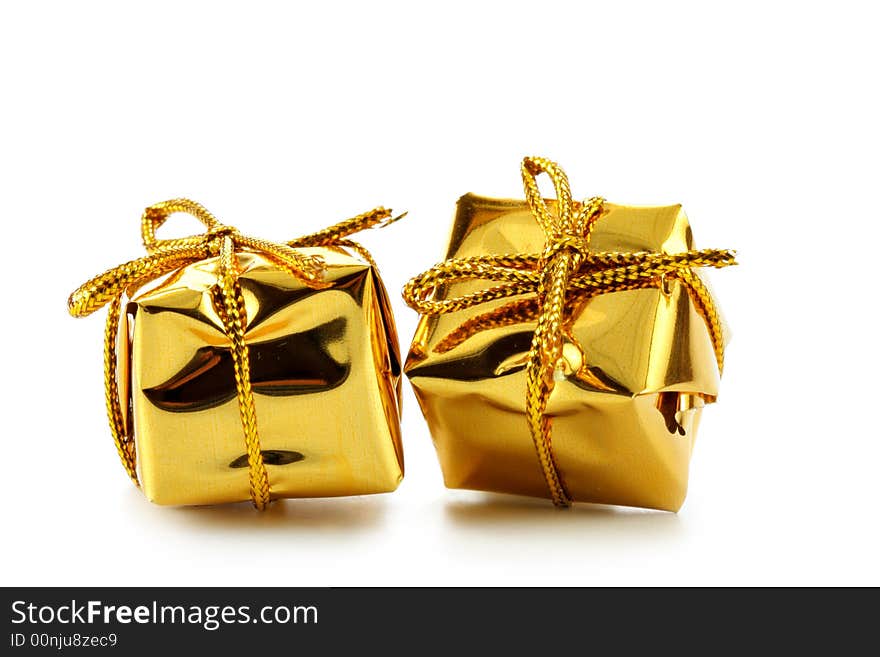 Two golden boxes isolated over white background