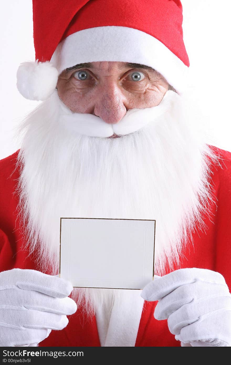 Santa holding a small blank white card. Santa holding a small blank white card