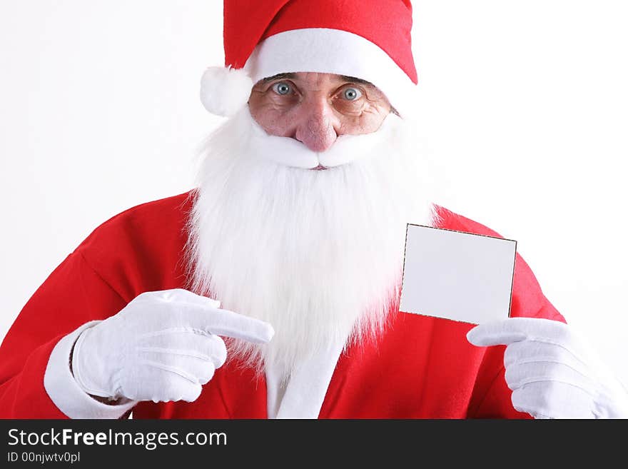 Santa holding a small blank white card. Santa holding a small blank white card