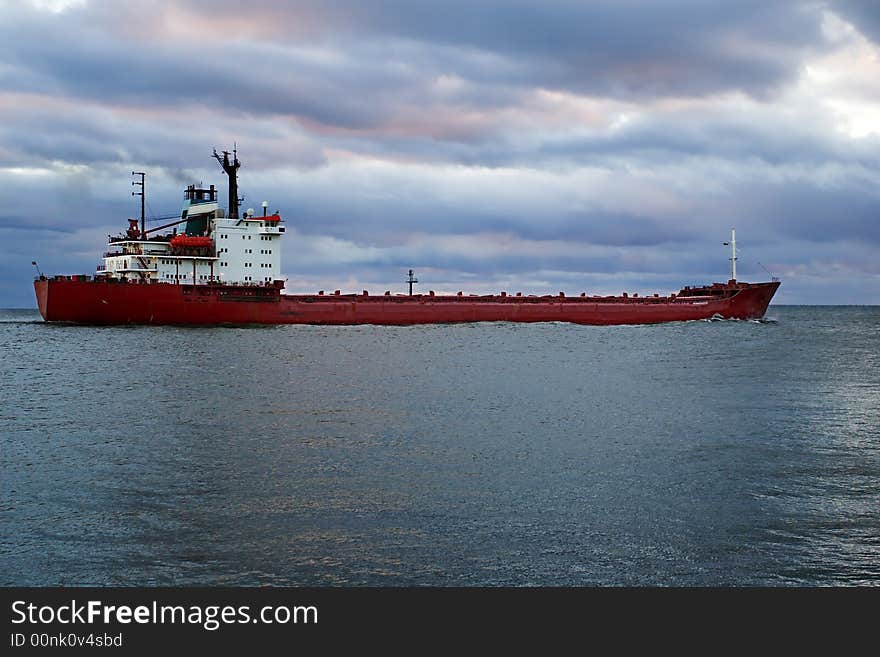 Cargo Vessel Going To The Open Sea