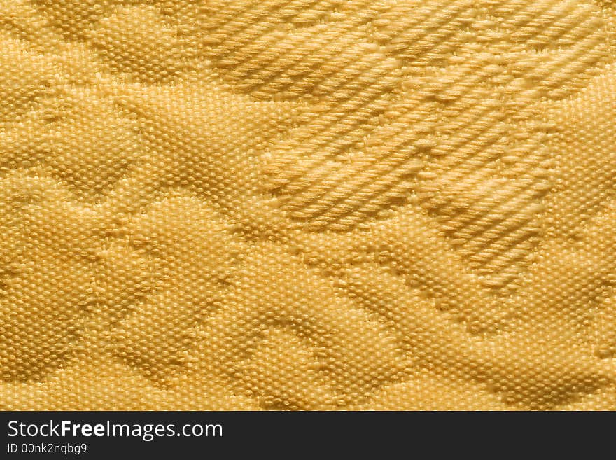 Abstract yellow embossed textile background