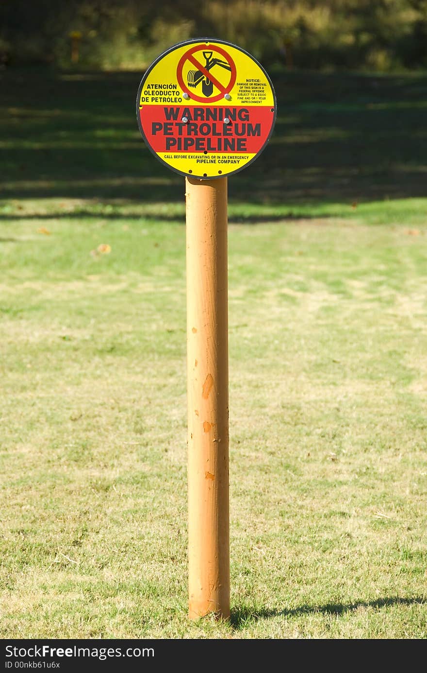 Picture of a warning sign for a petroleaum pipeline. Picture of a warning sign for a petroleaum pipeline