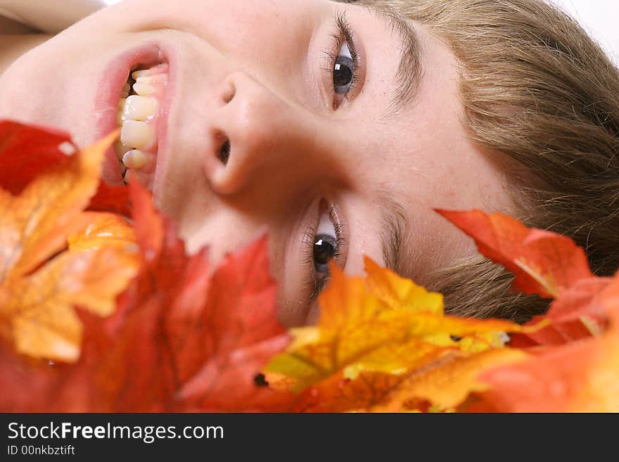 Laying in autumn leaves