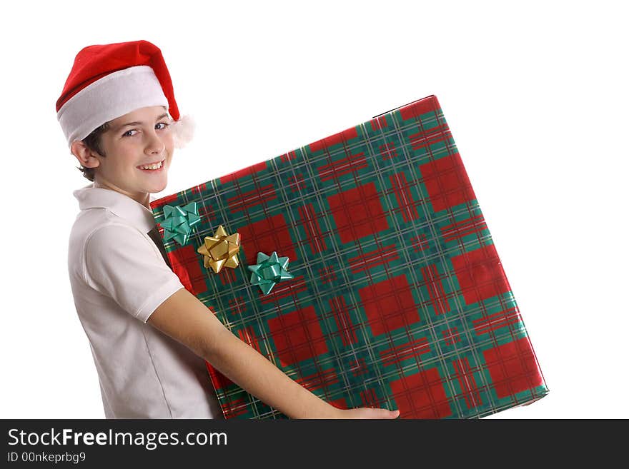 Shot of a child holding christmas present