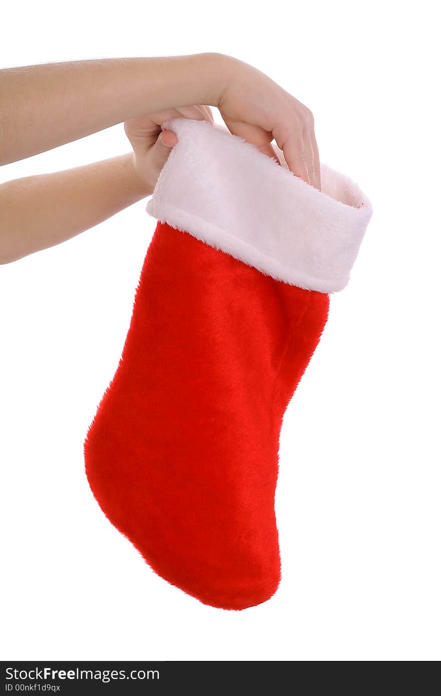 Childs hand reaching into stocking