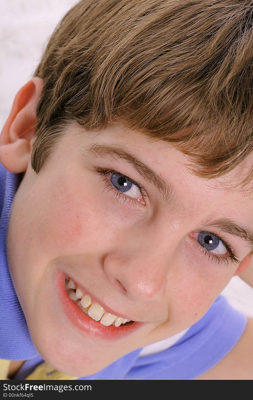 Photo of a Blue eyed child headshot