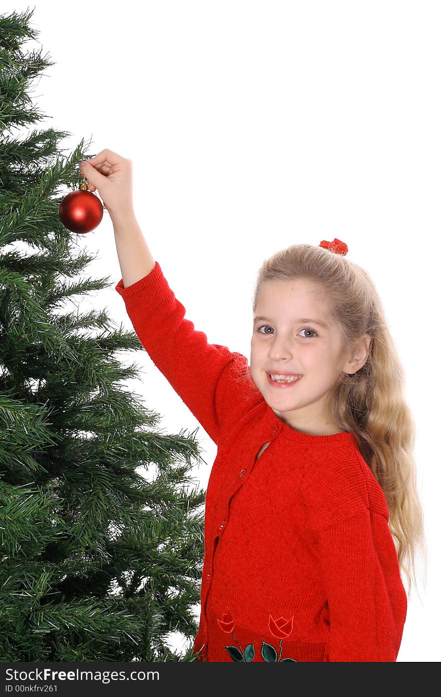 Happy child hanging ornament