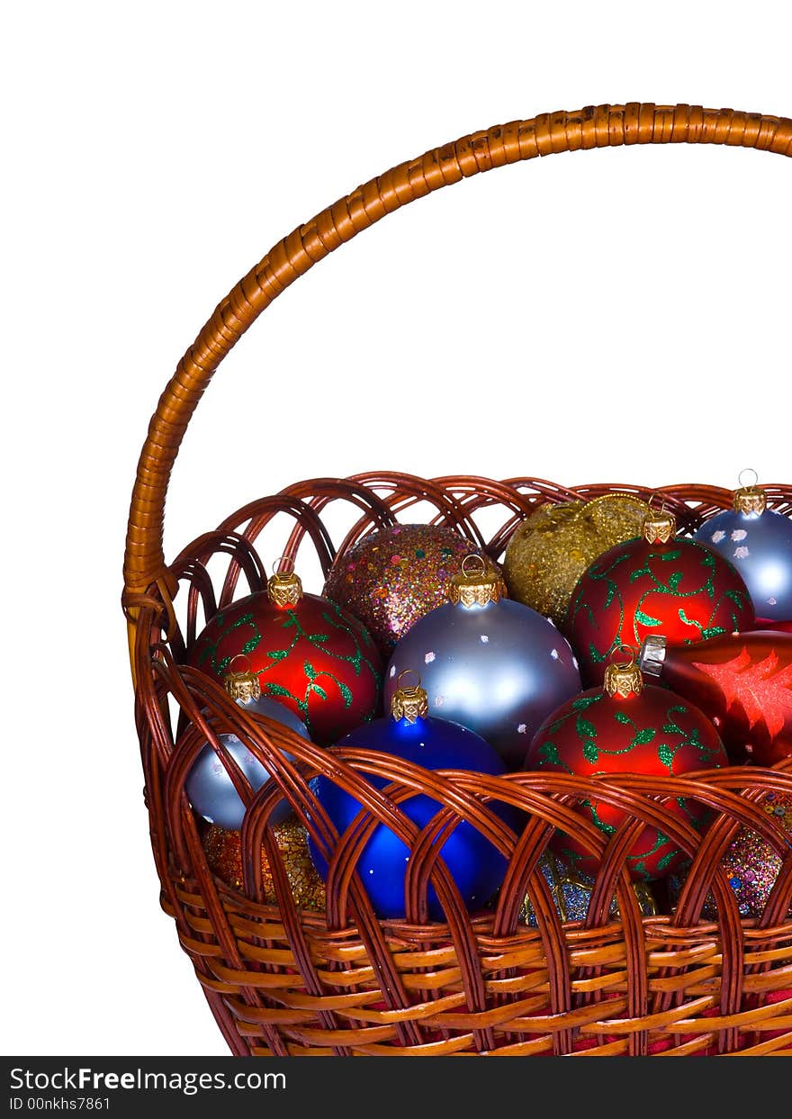 Basket with christmas balls, isolated on white background