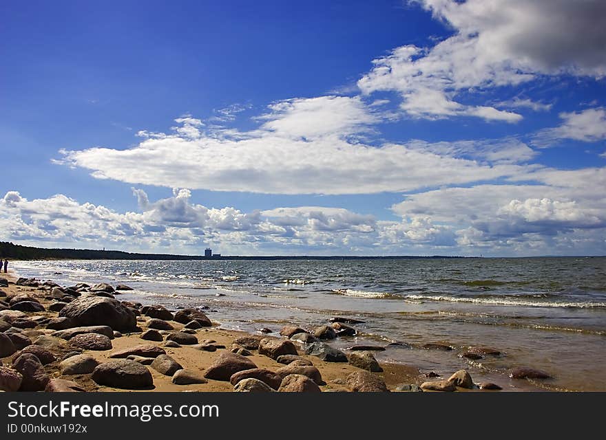 Landscape with blue sky, clouds, stones and sea. Landscape with blue sky, clouds, stones and sea