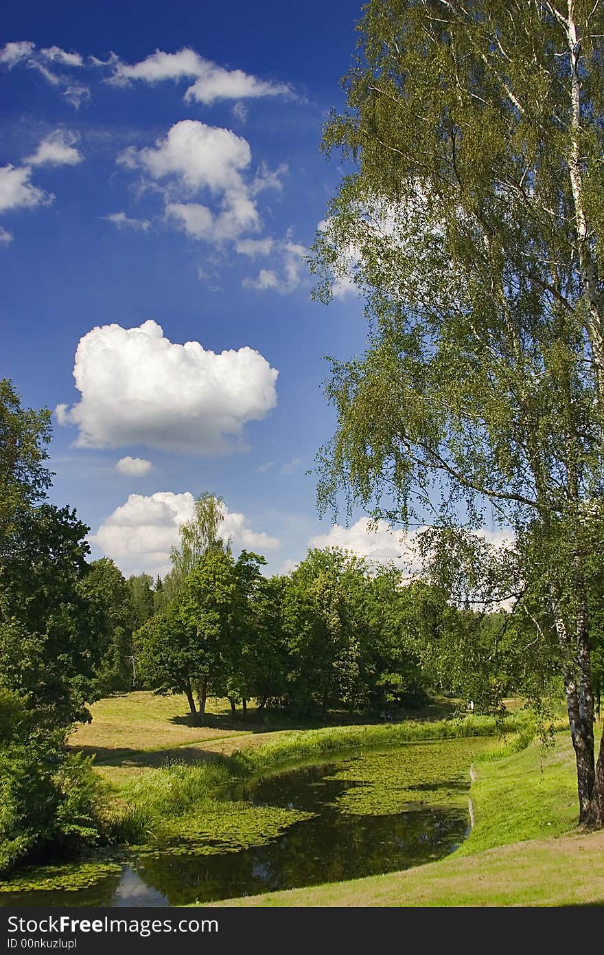 Landscape with blue sky, clouds, forest and lake. Landscape with blue sky, clouds, forest and lake