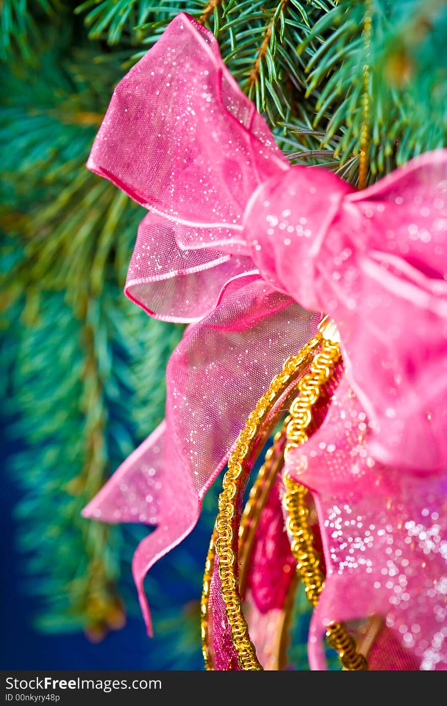 Close up view of the christmas ornament,
christmas, decoration, ornament, tree, holiday, red, celebration, night, lights, season, ribbon, illuminated, shiny, winter, sphere, bow, gold, traditional, paper, green, ball, home, interior, light, pine, color, december, branch, image, indoors, backgrounds, lighting, equipment, glass, decorating