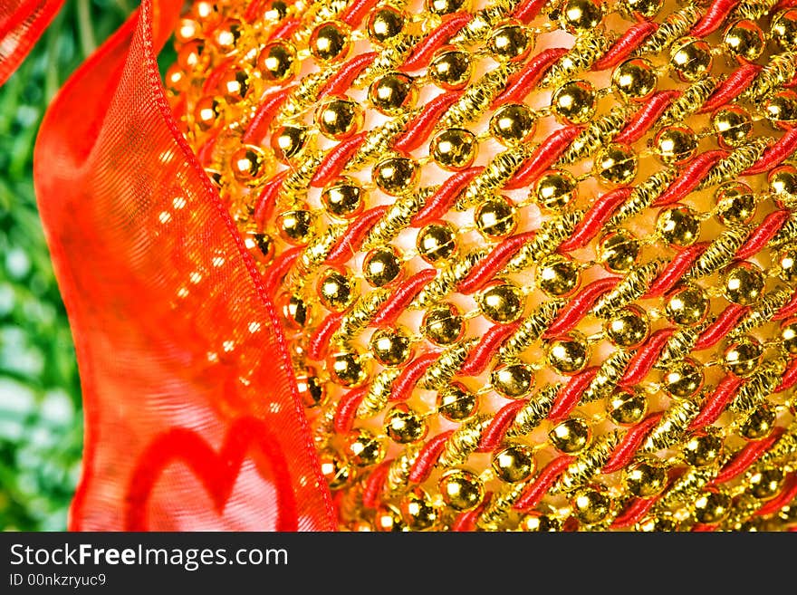 Close up view of the christmas ornament,
christmas, decoration, ornament, tree, holiday, red, celebration, night, lights, season, ribbon, illuminated, shiny, winter, sphere, bow, gold, traditional, paper, green, ball, home, interior, light, pine, color, december, branch, image, indoors, backgrounds, lighting, equipment, glass, decorating