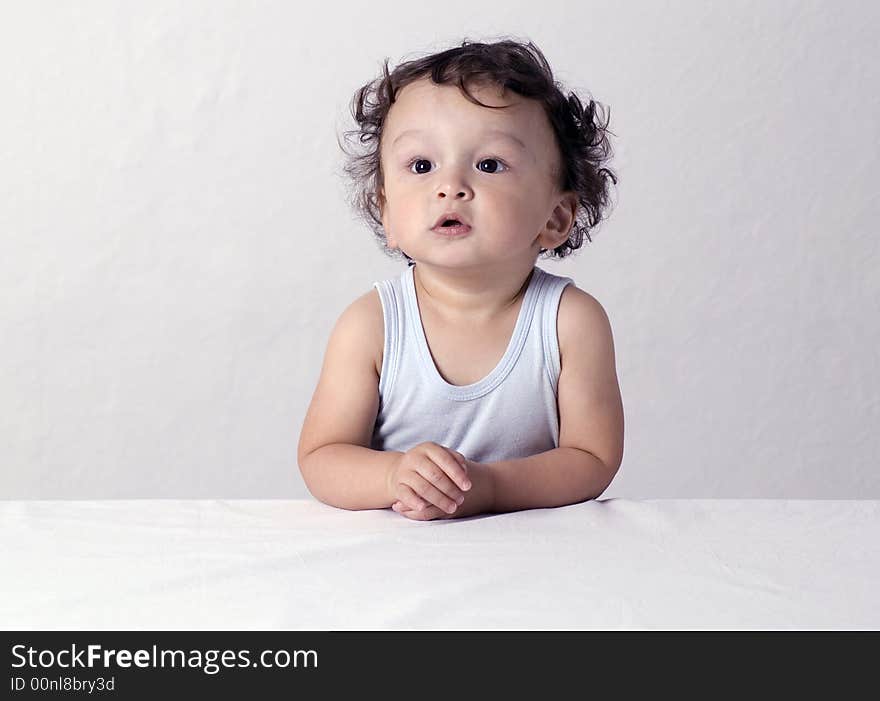 Portrait of the child with a thoughtful sight. Portrait of the child with a thoughtful sight.