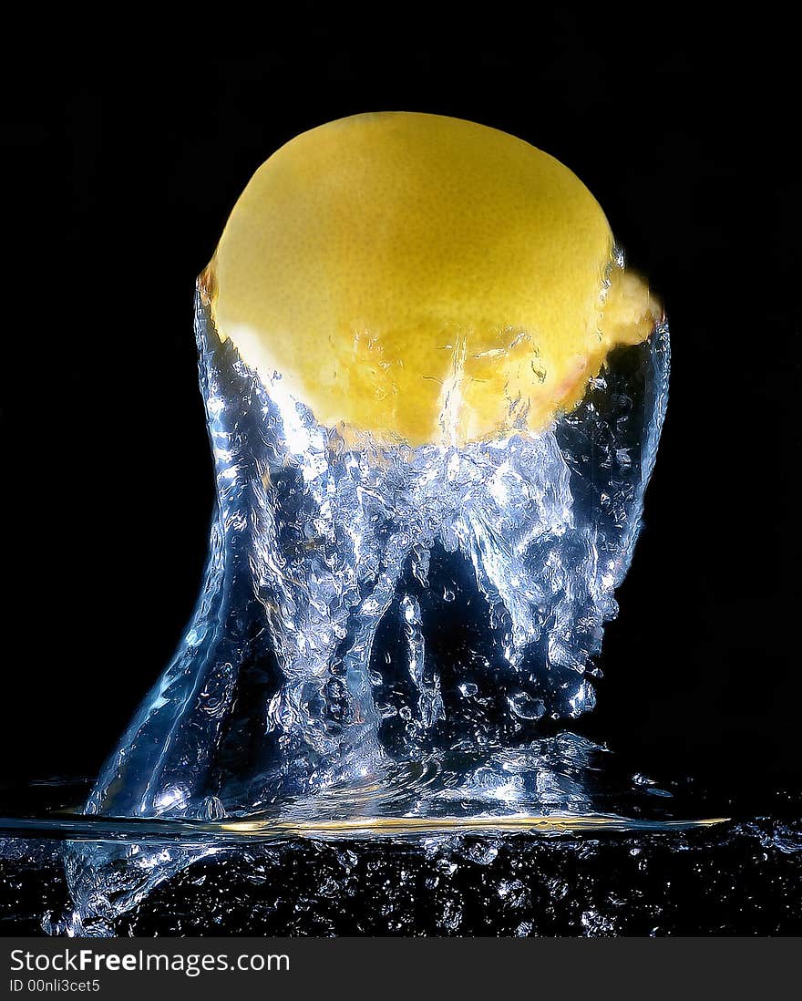 Scene of the lemon in water on black background