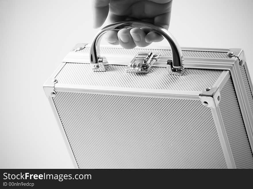 Hand grabbing a beautybox, photo in black and white. Hand grabbing a beautybox, photo in black and white