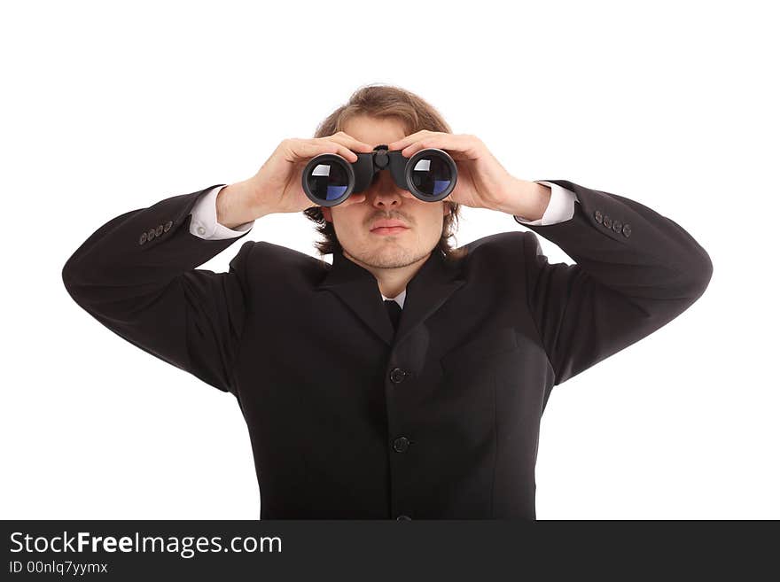 A portrait of a seeking businessman. Shot in studio. A portrait of a seeking businessman. Shot in studio.