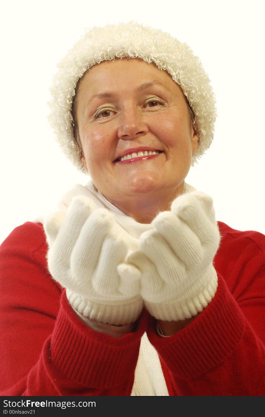 Bright, cheerful portrait of an attractive older woman dressed in winter fashion items. Bright, cheerful portrait of an attractive older woman dressed in winter fashion items