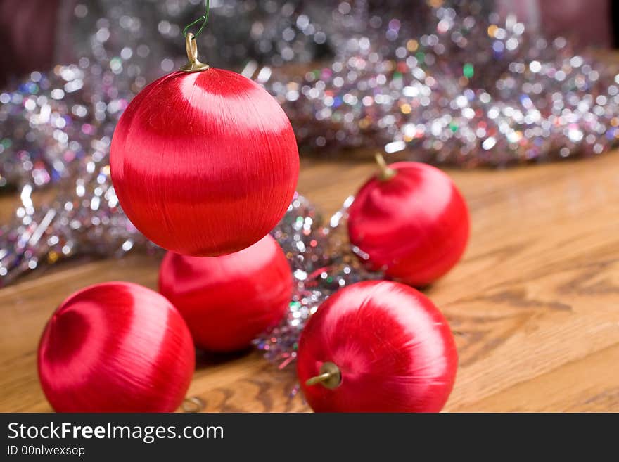 Red Christmas ornaments with multicolored glitter. Red Christmas ornaments with multicolored glitter