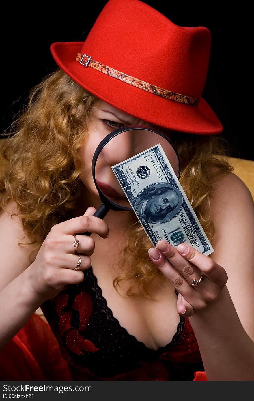 The beautiful woman checks money