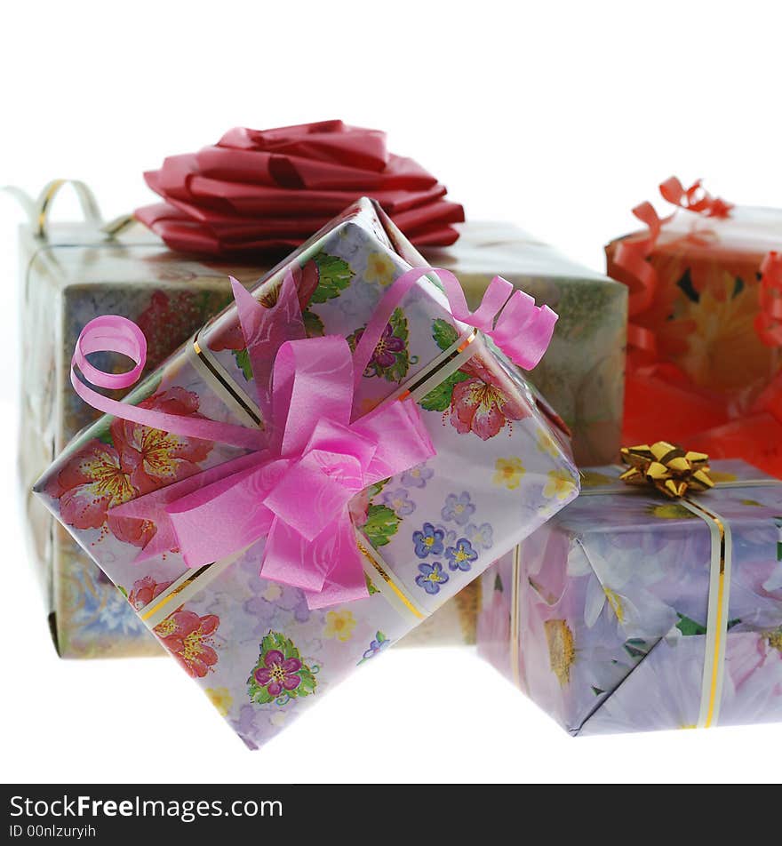 Gift with a pink bow. It is isolated on a white background