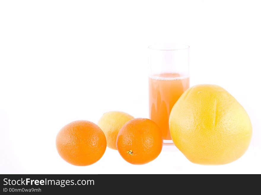 Lemon, orange, grapefriut and juice isolated on white. Lemon, orange, grapefriut and juice isolated on white