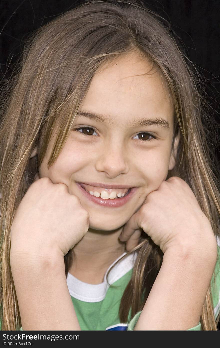 Cute caucasian american girl resting head on the hands. Cute caucasian american girl resting head on the hands