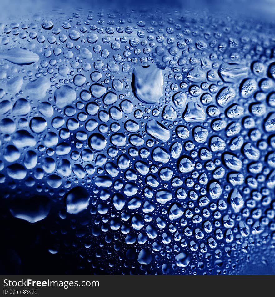 Water drops on shiny surface after rain storm