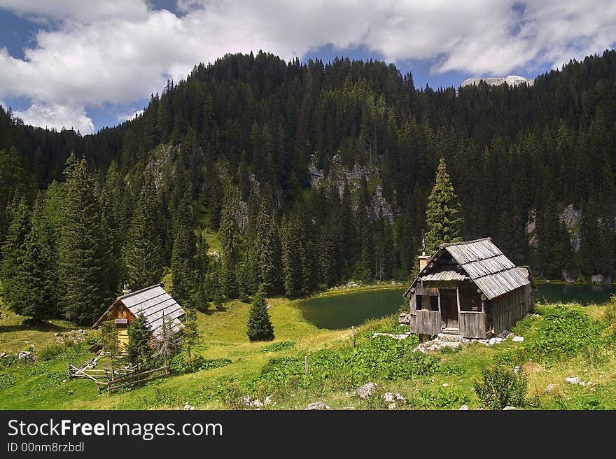 Apline huts by the lake.