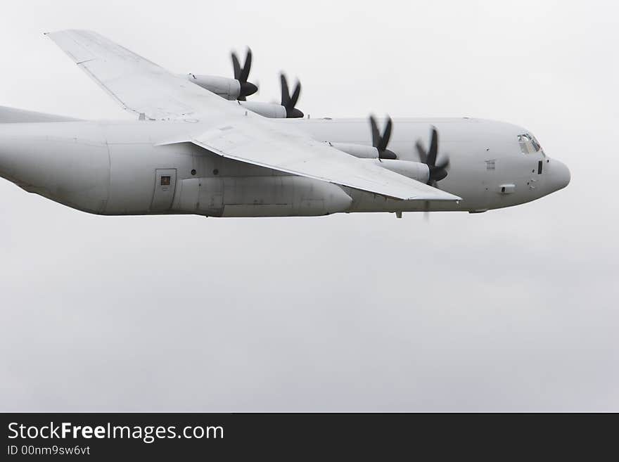 Military transport aircraft (Hercules) in flight. Military transport aircraft (Hercules) in flight