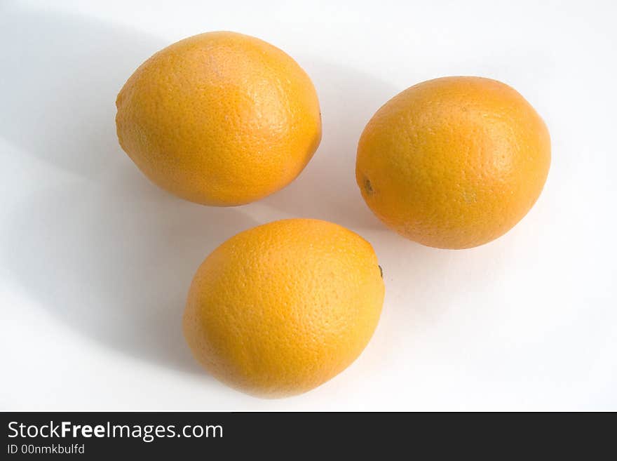 Three oranges with white background