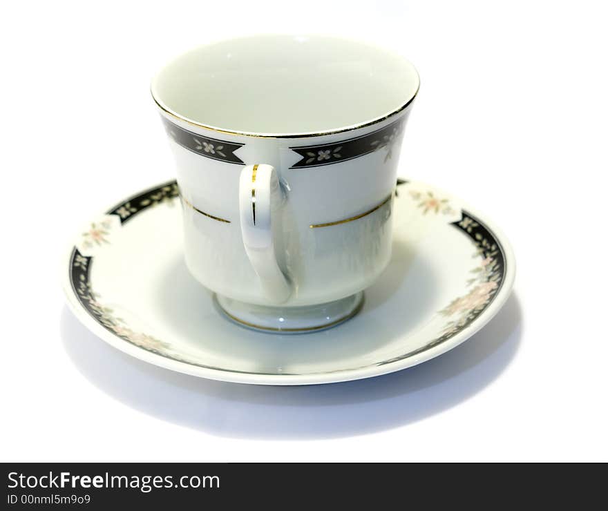 Porcelain tea cup and saucer with white background. Porcelain tea cup and saucer with white background